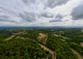 Aerial Panorama between Vaugines and Cucuron: Cloudy Skies Over Ancient and New Forests in PACA, Provence Royalty Free Stock Photo